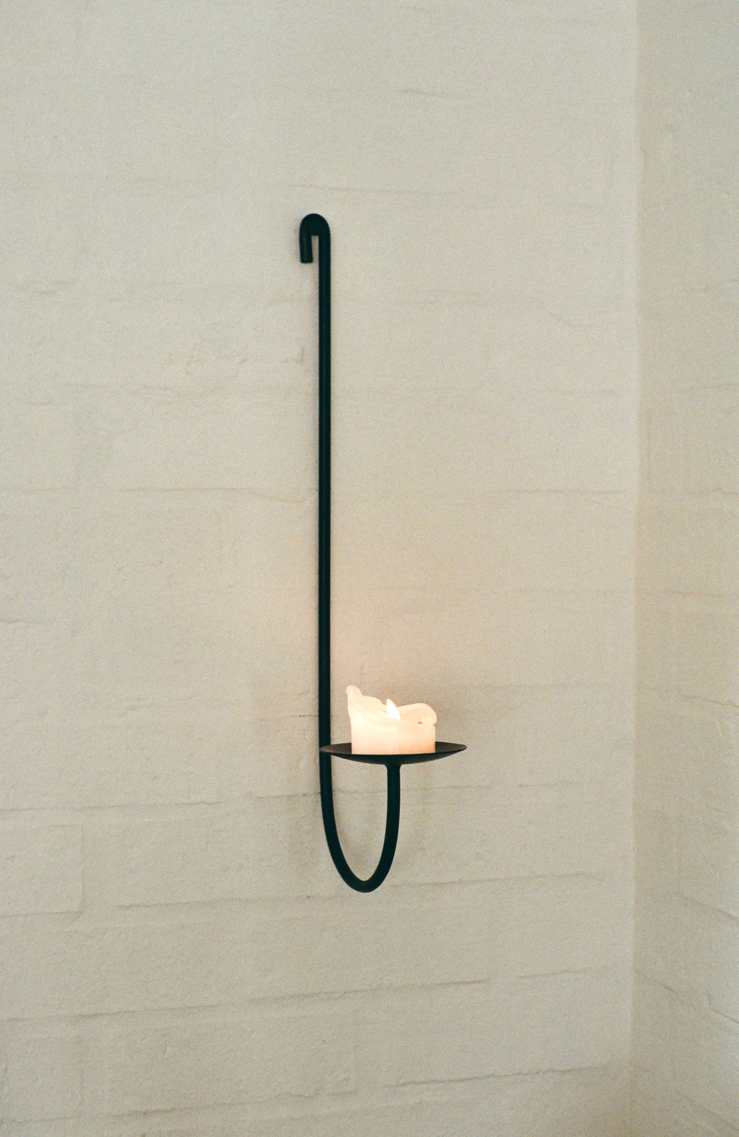 Sacra wall-mounted candle holder