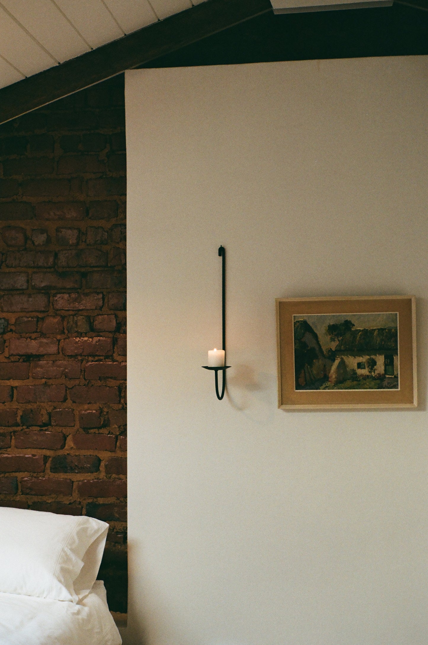 Sacra wall-mounted candle holder