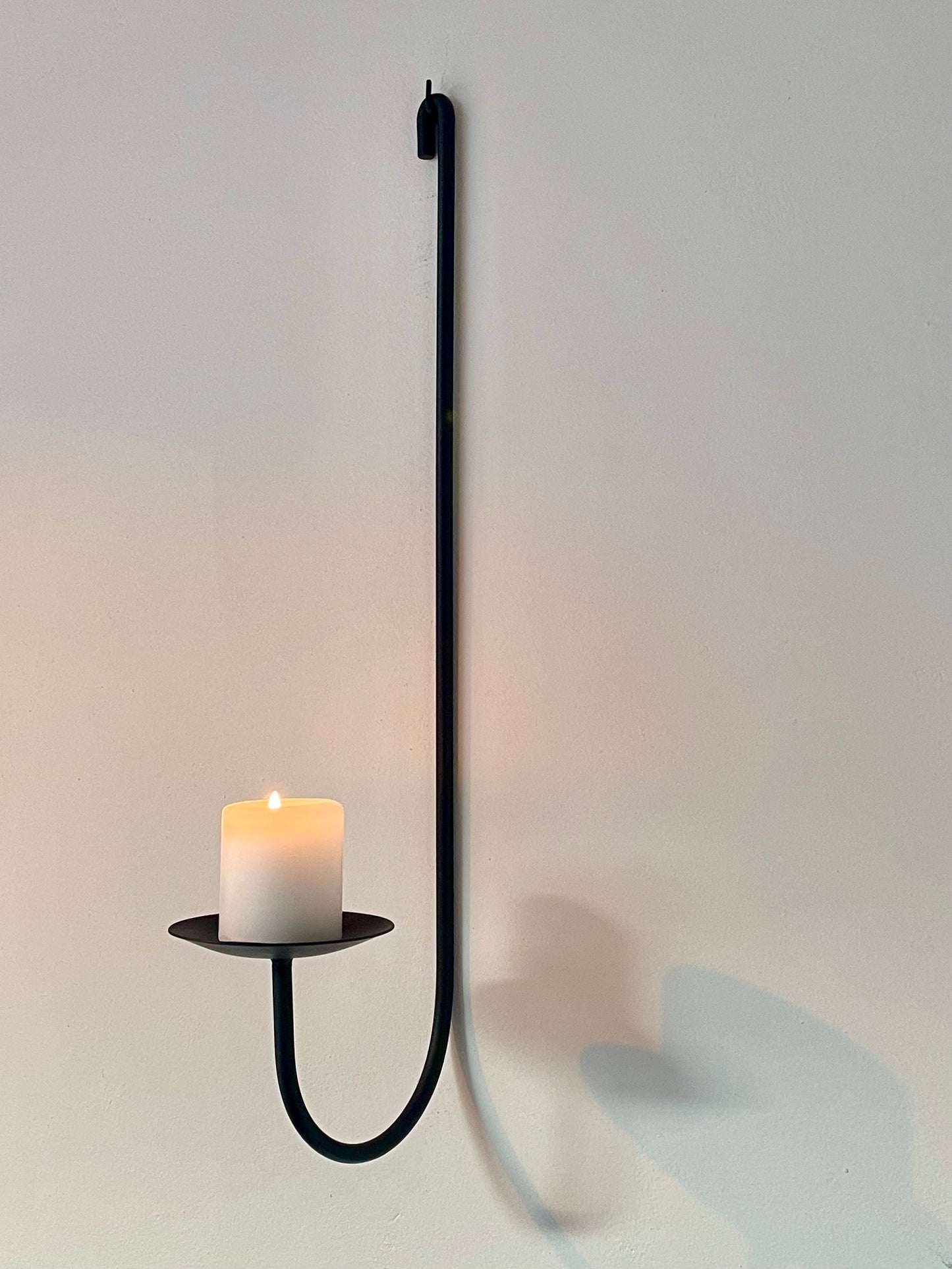 Sacra wall-mounted candle holder