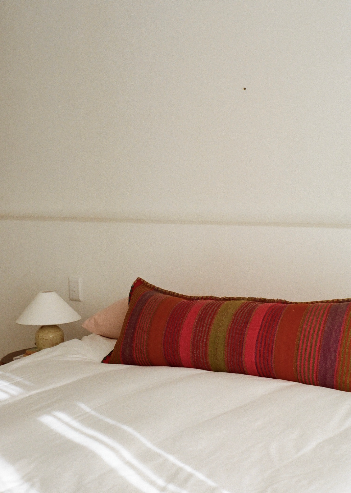 Oblong rainbow cushion cover